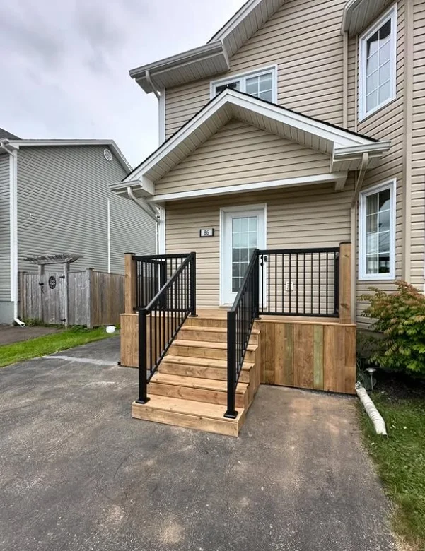 minimalist decor on small front deck entrance