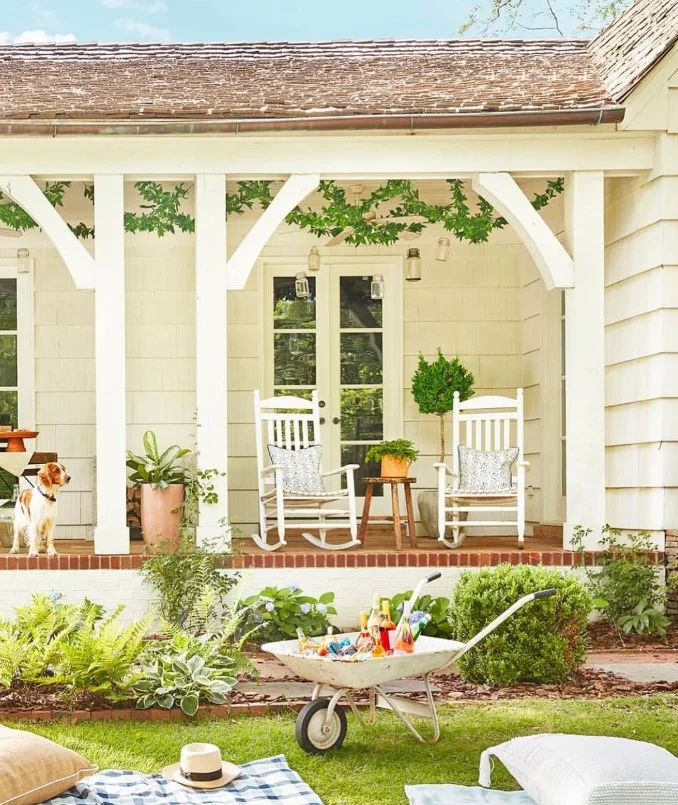 small front deck entrance with cozy seating area