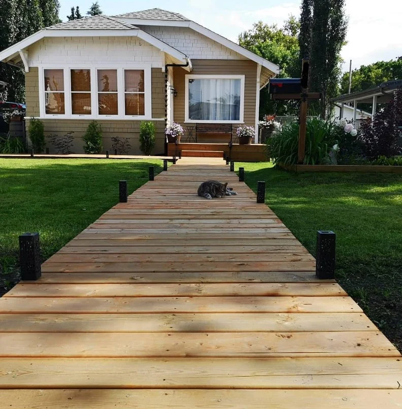 symmetrical decor on small front deck entrance