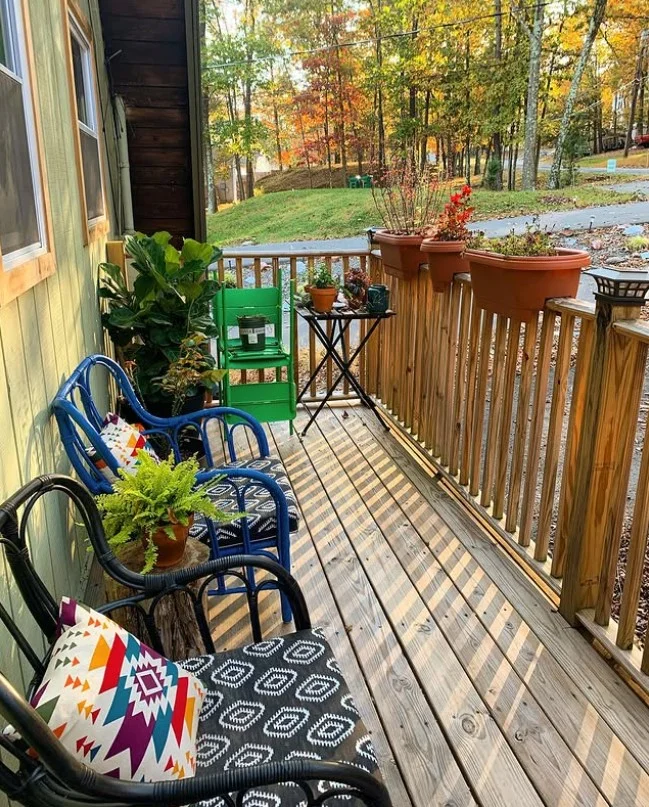 wood railings on modern small front deck