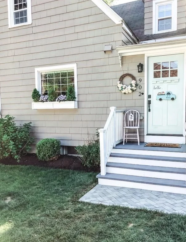 modern front walkway leading to small entryway