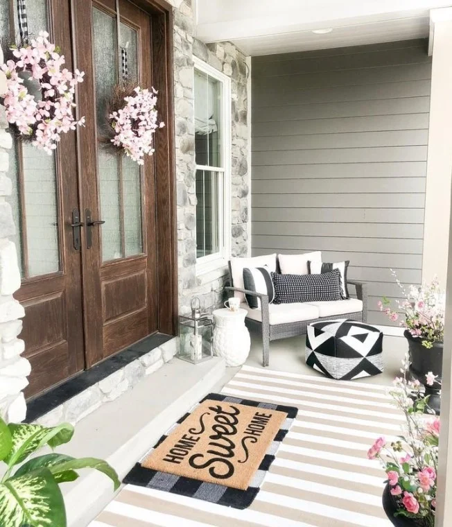 small wooden bench on cozy front entryway