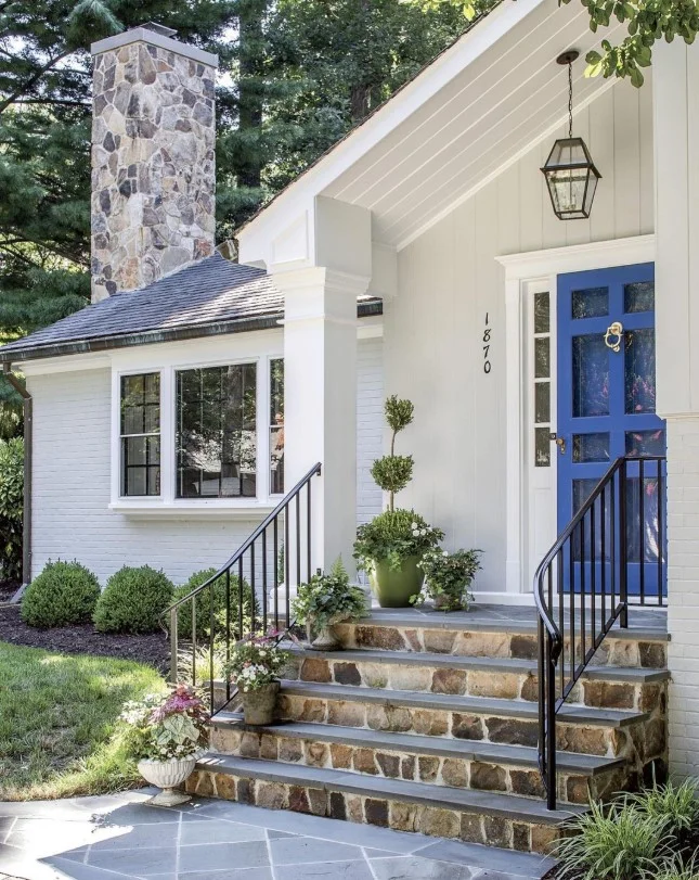 black metal railings on modern small porch