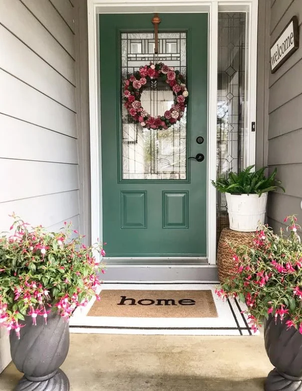 front door with simple wreath small porch decor