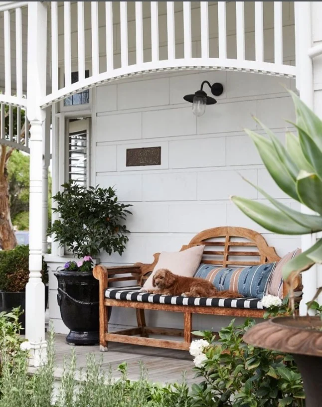 small porch entrance with slim bench cozy seating
