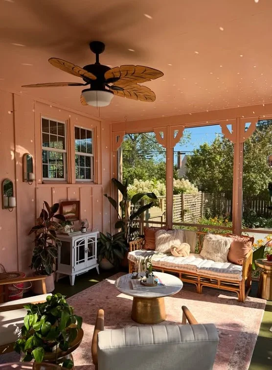 small sunroom with coffee table cozy seating area