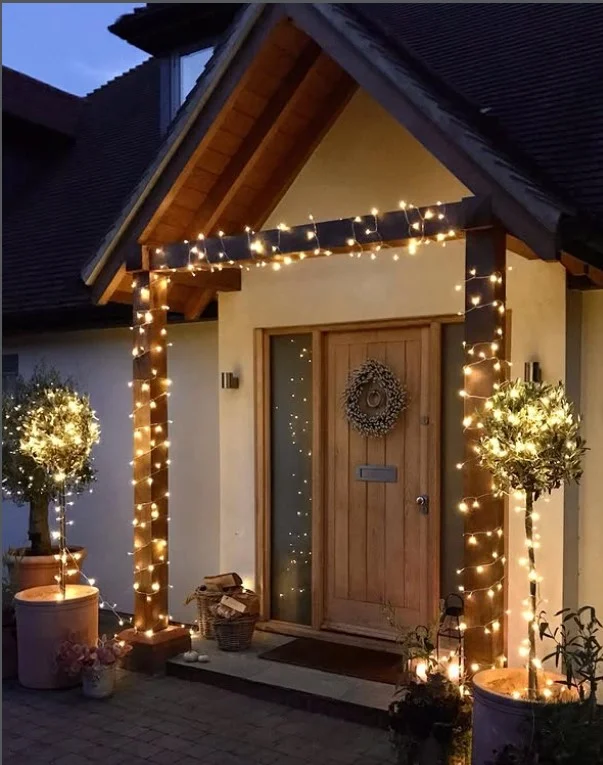 small front stoop with string lights cozy evening decor