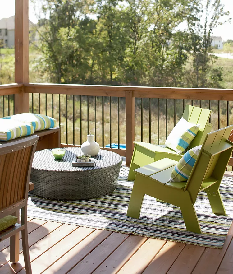 cozy outdoor deck with natural wood railing and seating