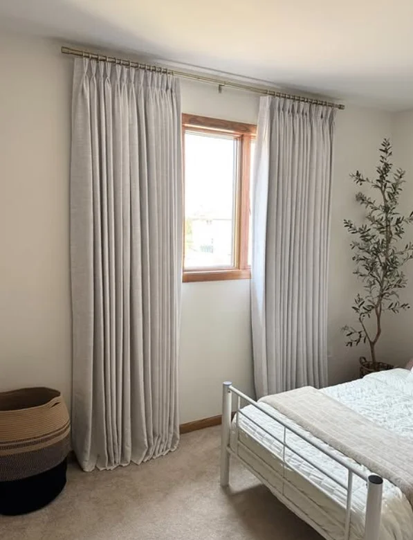 neutral bedroom curtains with beige and cream interior decor