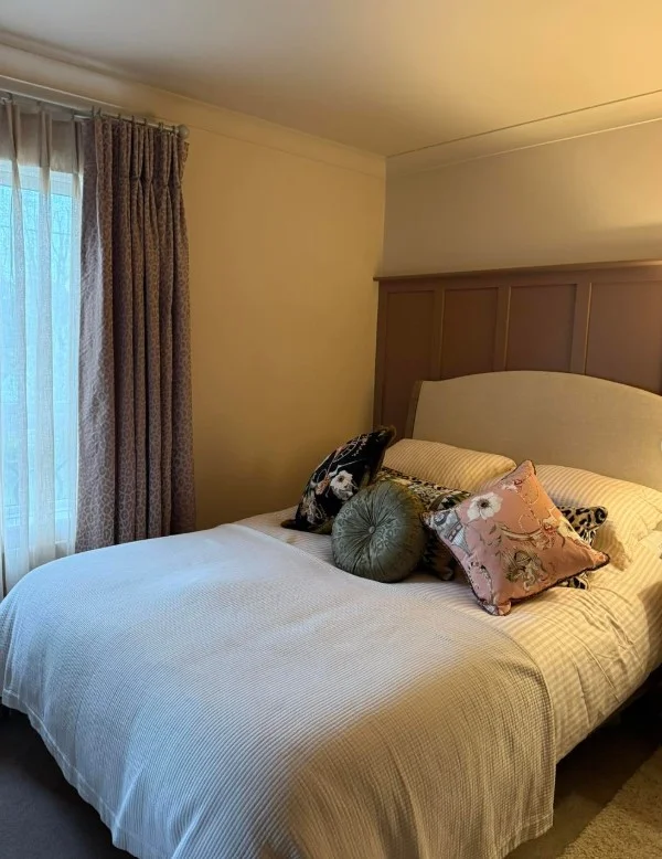 textured bedroom curtains adding warmth and depth to room