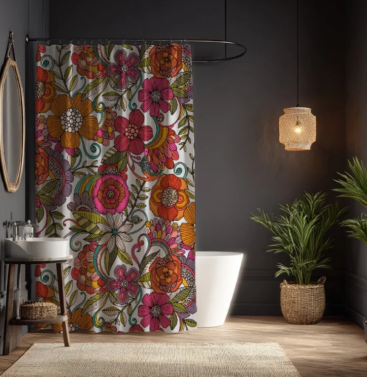 black shower curtain rod with white fabric curtain