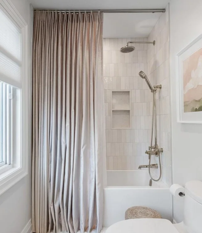 ceiling mounted shower curtain track in luxury bathroom