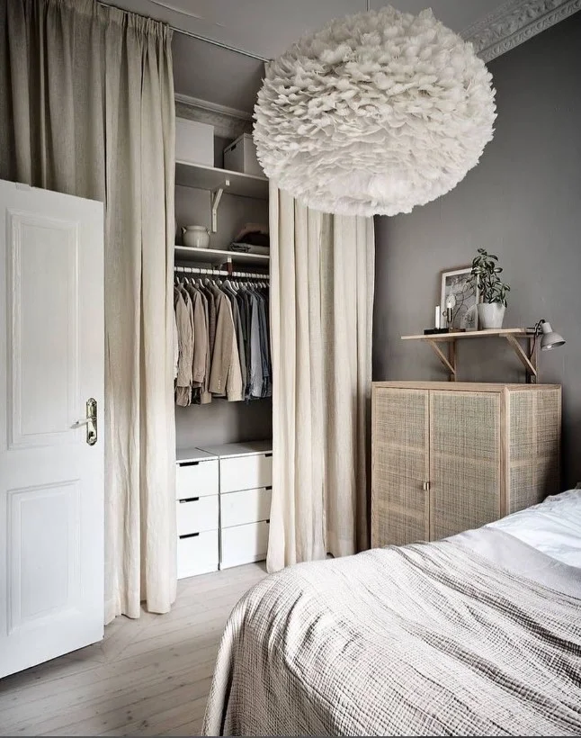floor to ceiling closet curtains creating custom built look