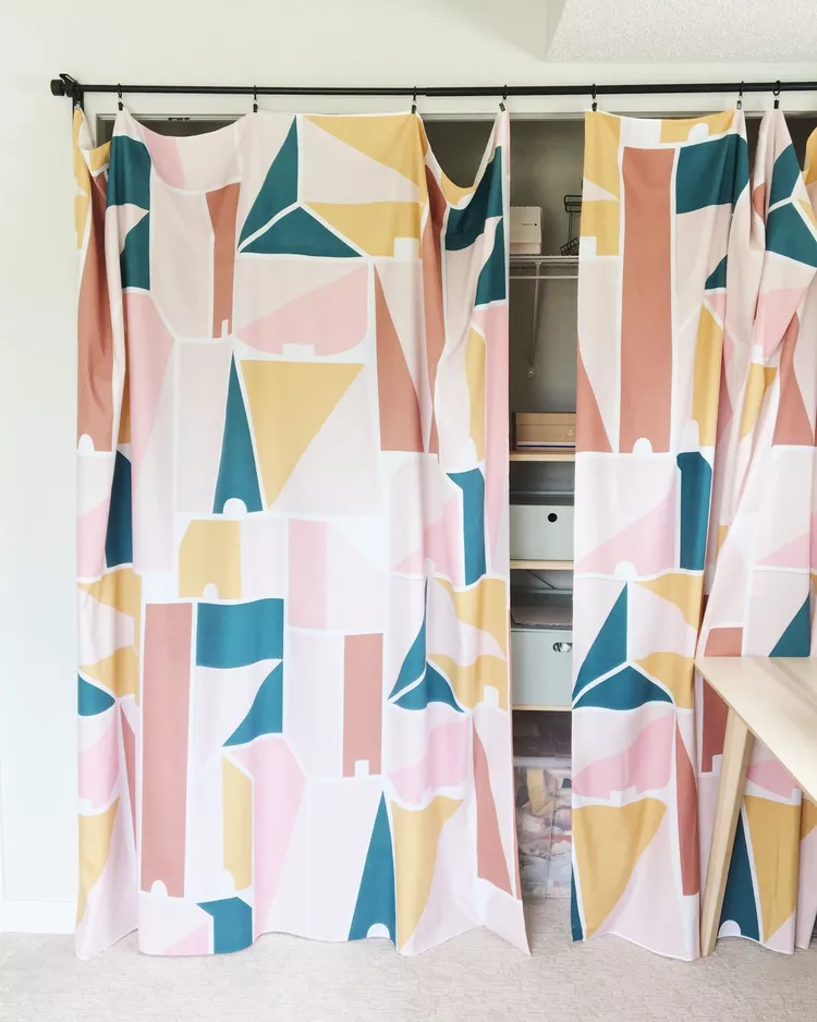 patterned closet curtains adding personality to bedroom