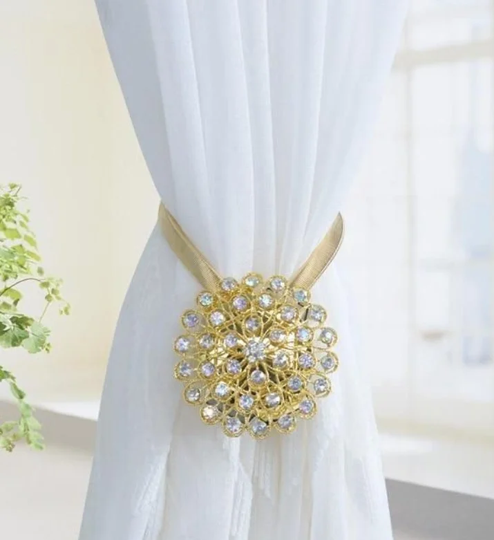 crystal curtain tie backs reflecting sunlight in luxury bedroom