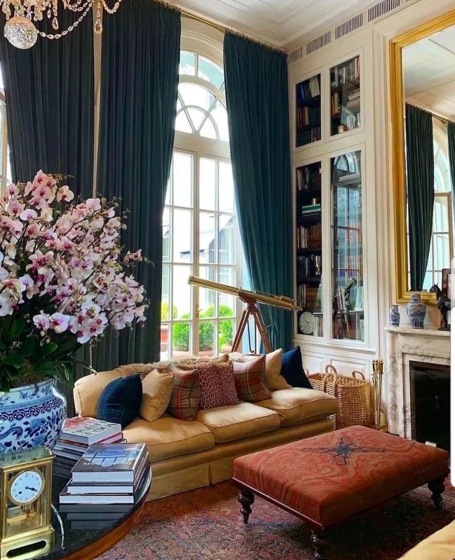 english manor study with dark wood desk and vintage decor