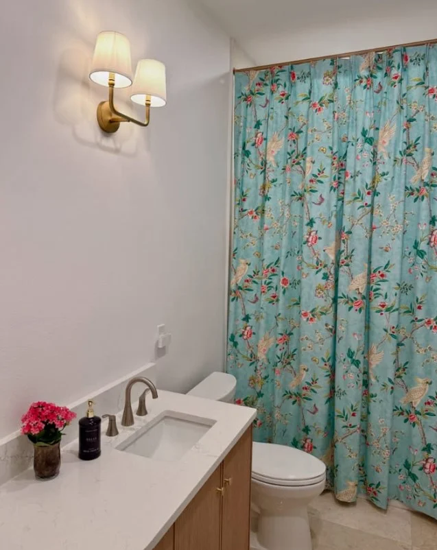 extra long shower curtain reaching near bathroom floor