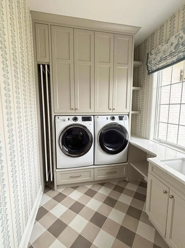 floor to ceiling laundry room cabinets with washer and dryer storage