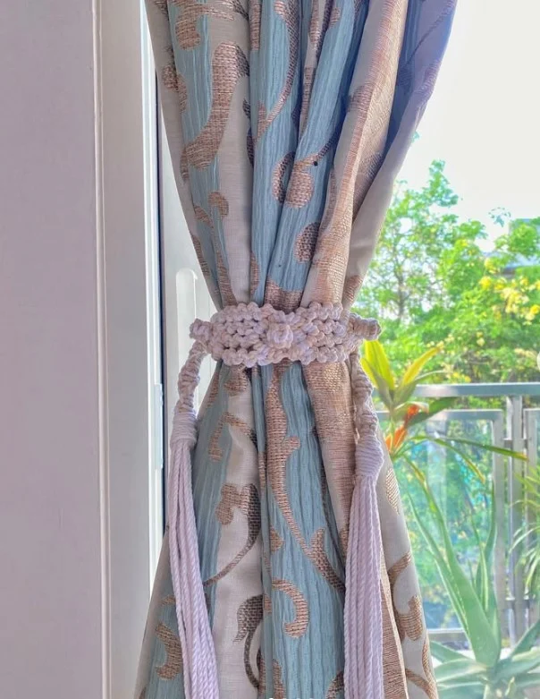 boho macrame curtain tie backs with neutral curtains