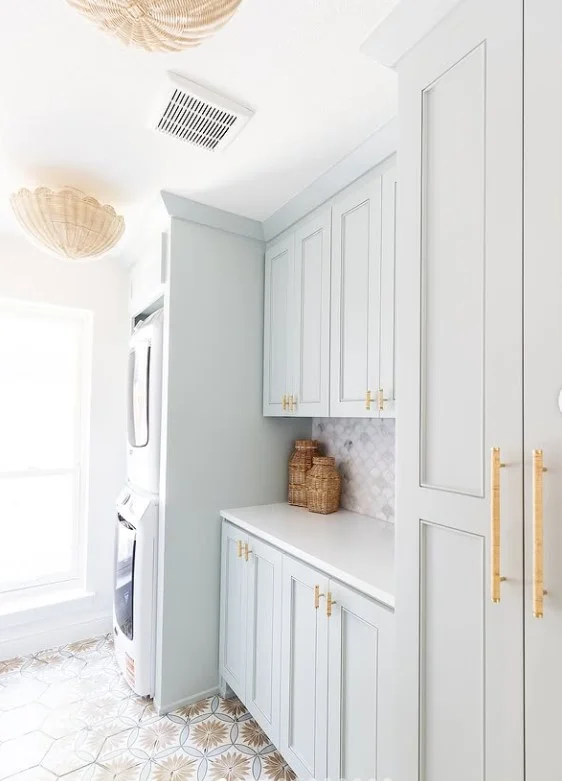minimalist Sims 4 laundry room with white cabinets