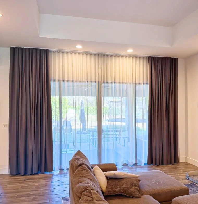 white sheer patio door curtains with bright natural sunlight