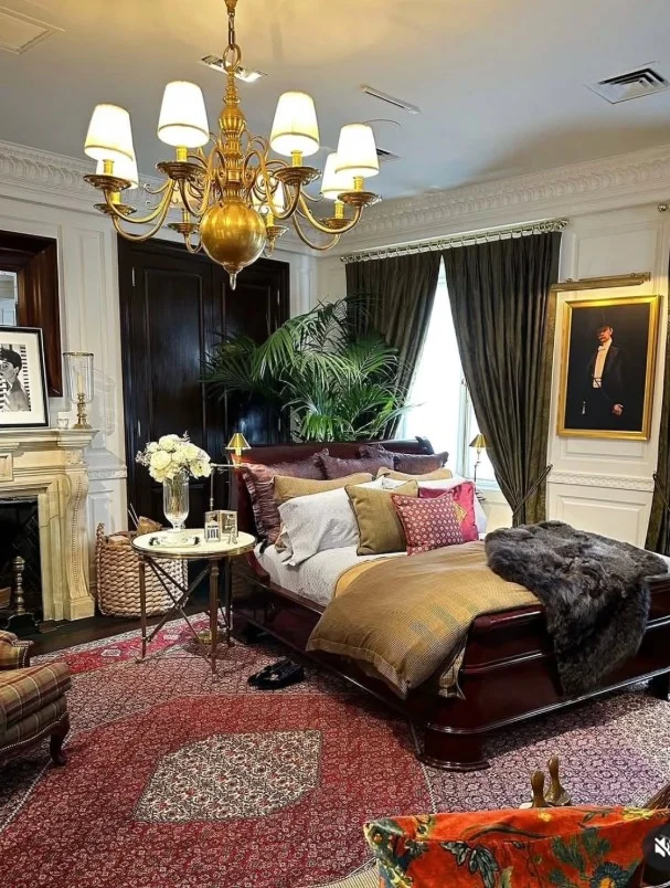 plaid bedroom design with layered bedding in ralph lauren home aesthetic
