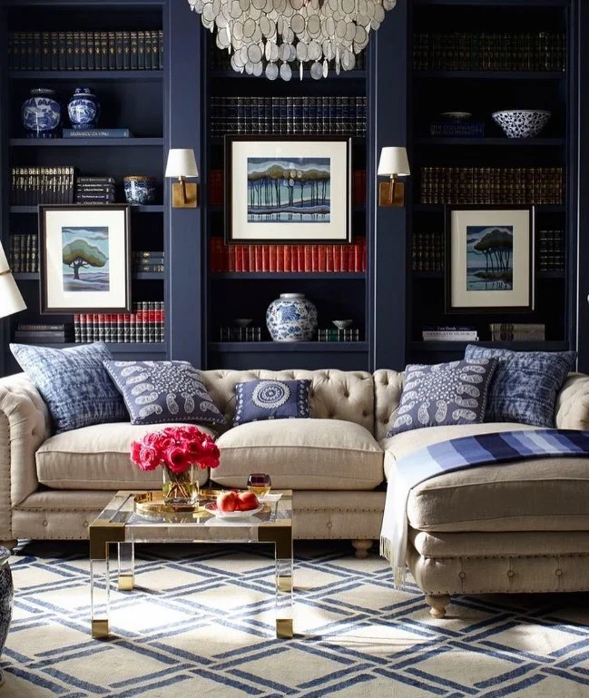 ralph lauren navy blue living room with brass accents and classic furniture