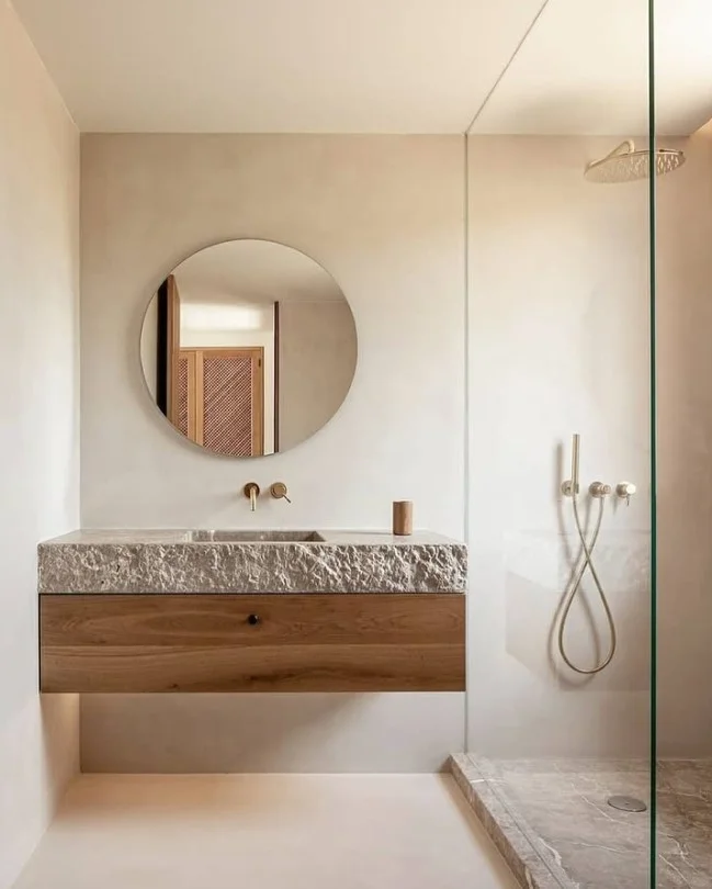 round mirror above floating vanity in bloxburg bathroom