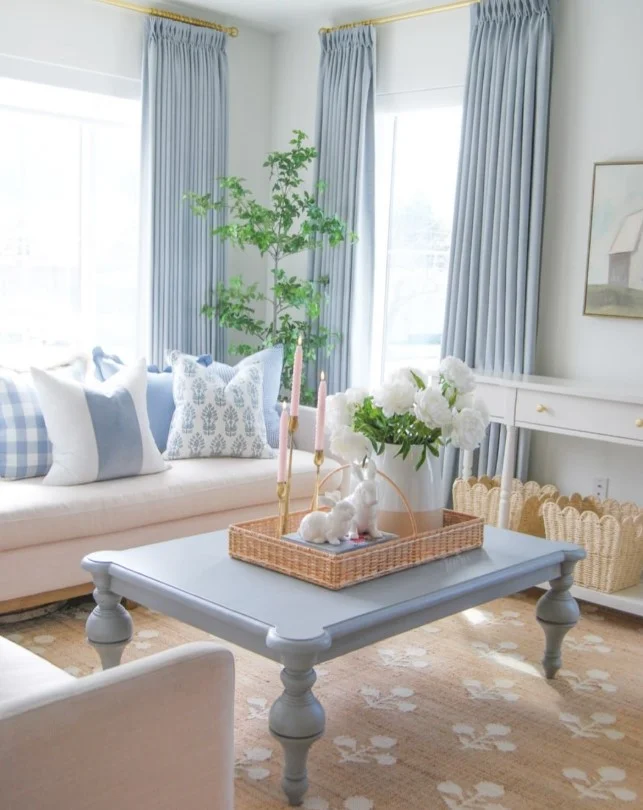 soft blue curtains creating a peaceful sitting room atmosphere