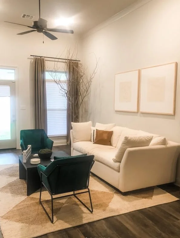 warm taupe curtains creating inviting sitting room decor