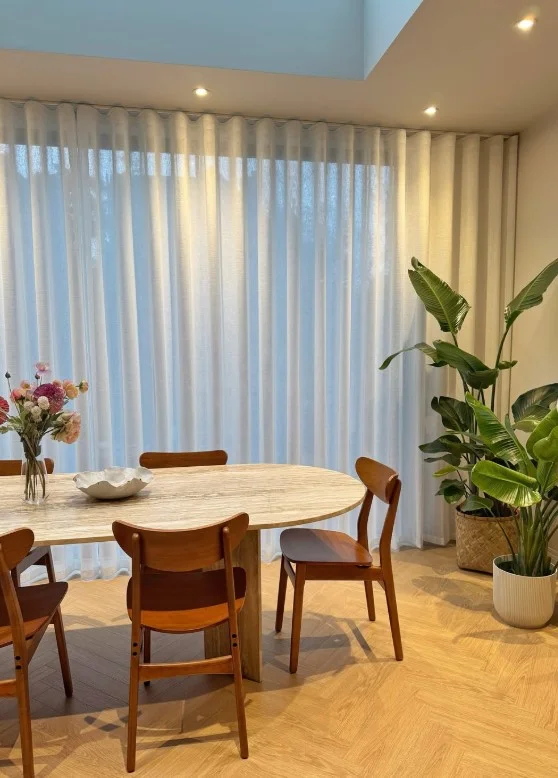 floor to ceiling sliding door curtains creating elegant modern living room