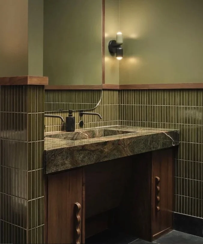 sage green japandi bathroom with wooden vanity