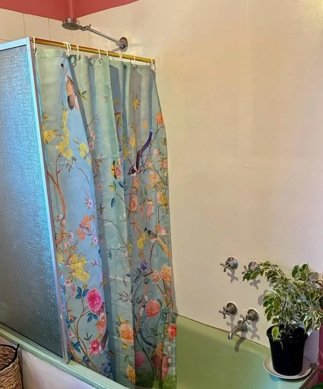 floral tall shower curtain adding charm to bathroom space