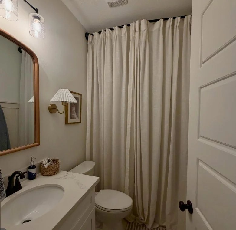 neutral shower curtain matching bathroom wall color