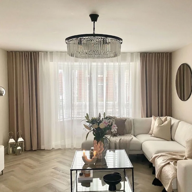 floor to ceiling living room curtains making windows look larger