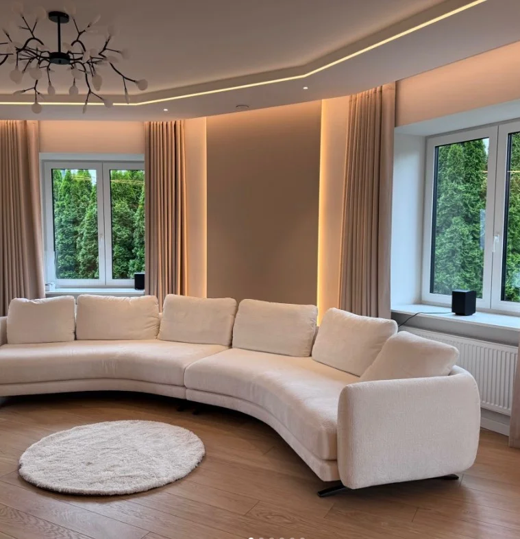warm beige living room curtains creating cozy atmosphere